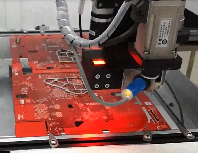 Applying UV adhesive to the PCB board