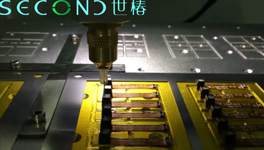 needle dispensing in camera module lens bonding.