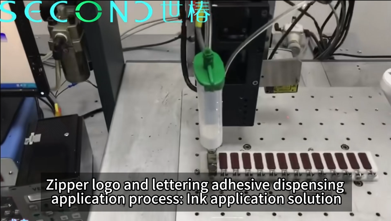 Zipper logo and lettering adhesive dispensing application process Ink application solution
